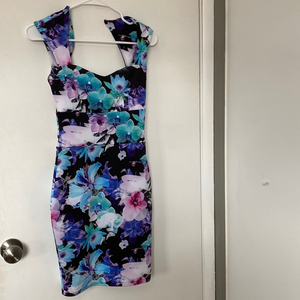 Wore once to a wedding and does not fit me anymore.